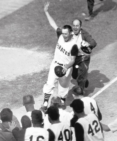 B&W photo of Pittsburgh Pirate Bill Mazeroski crossing home plate after hitting a home run to win the 1960s World Series.