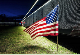 The Wall That Heals Vietnam Memorial with U.S. Flag