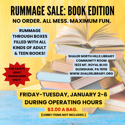 Stack of colorful books with the top one open